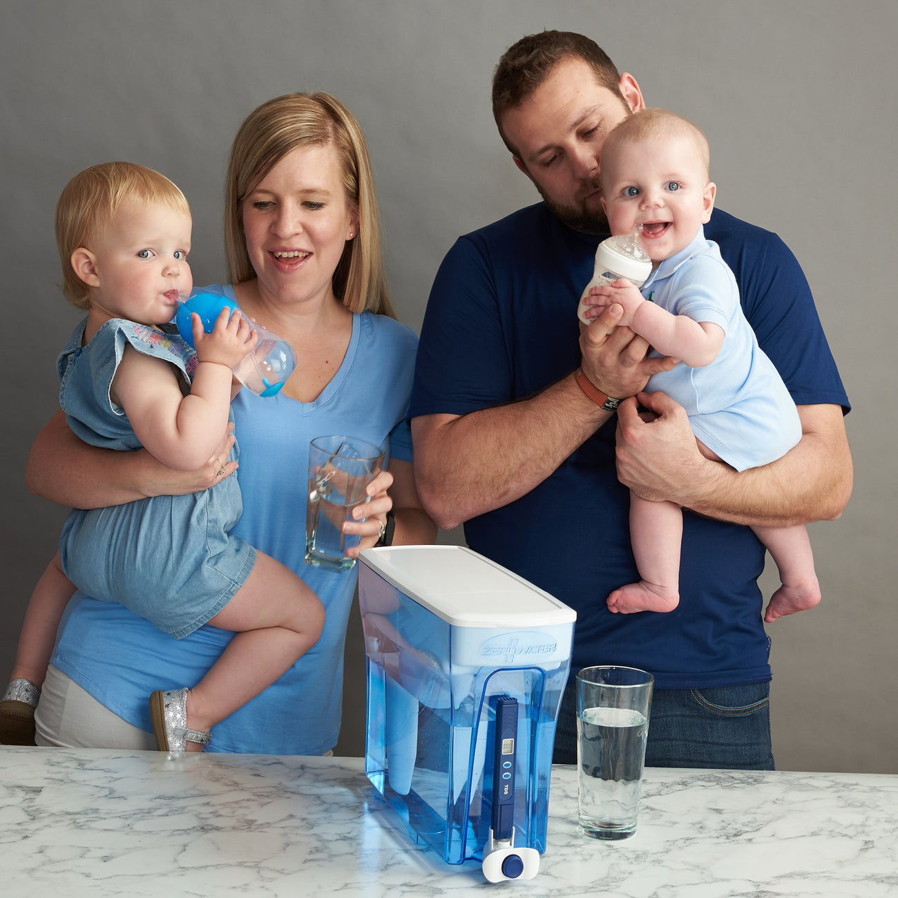 Family Drinking Filtered Water with 23 Cup Dispenser | ZeroWater